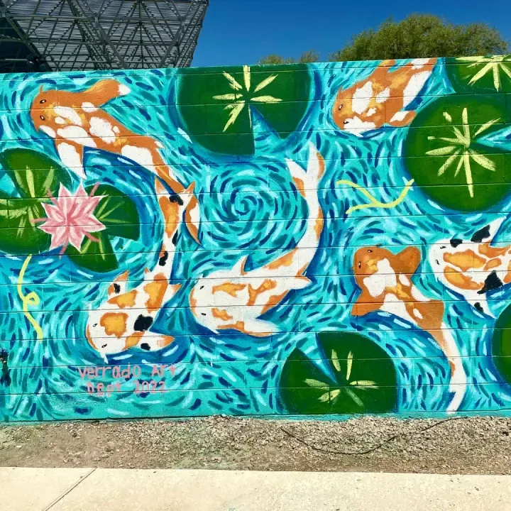 Koi pond mural on a block wall, painted with the Verrado art program