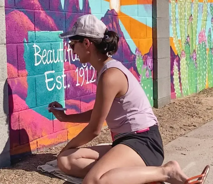 Brigitte De Marco hand-lettering Est. 1912 on the Beautifully Wild mural