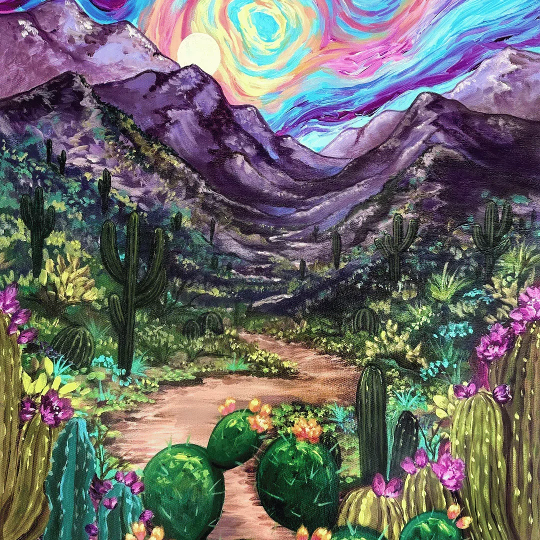 Brigitte De Marco at work on a colorful desert painting