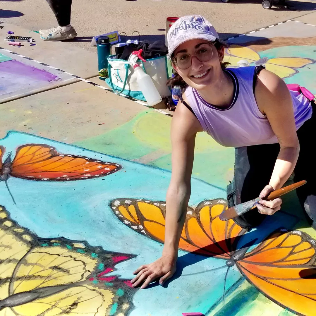 Brigitte De Marco painting outdoors